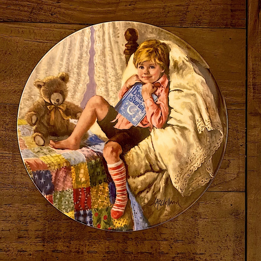 Knowles collector plates 2 in hand